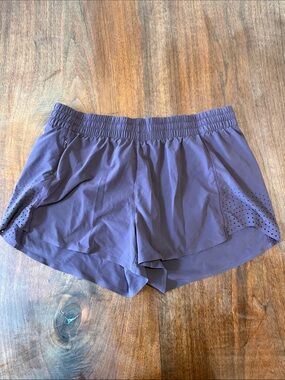 Athleta Deep Purple Athletic Shorts with Perforated Side Panels